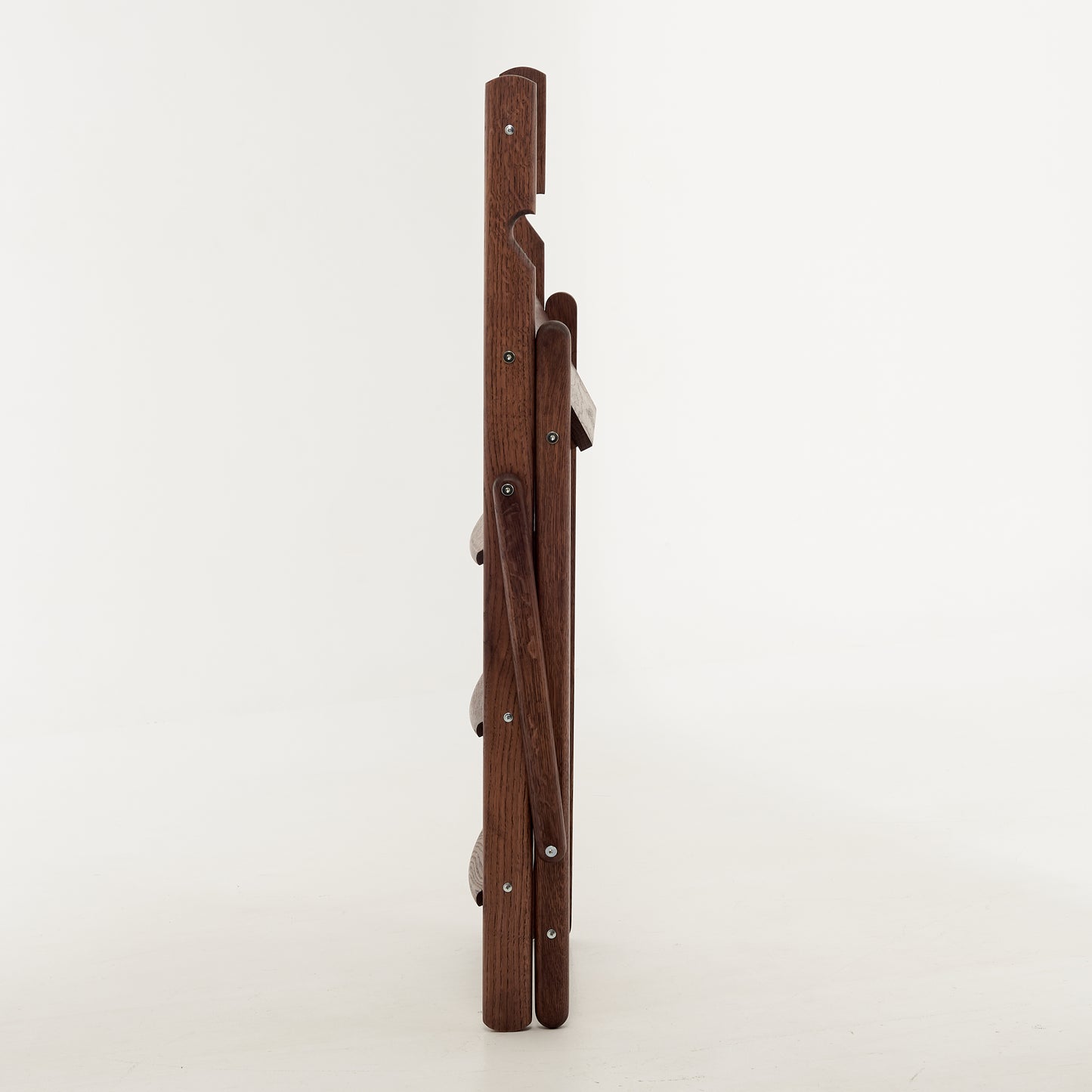 Folded oak ladder for easy storage in small spaces

