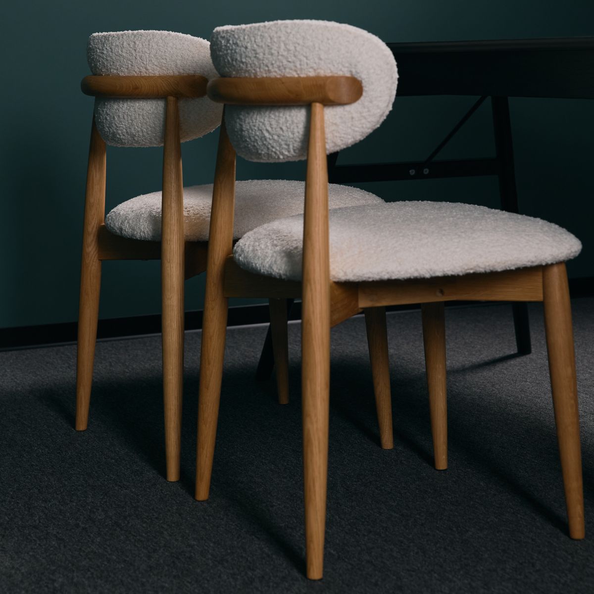 Scandinavian dining chair with solid oak frame and upholstered backrest
