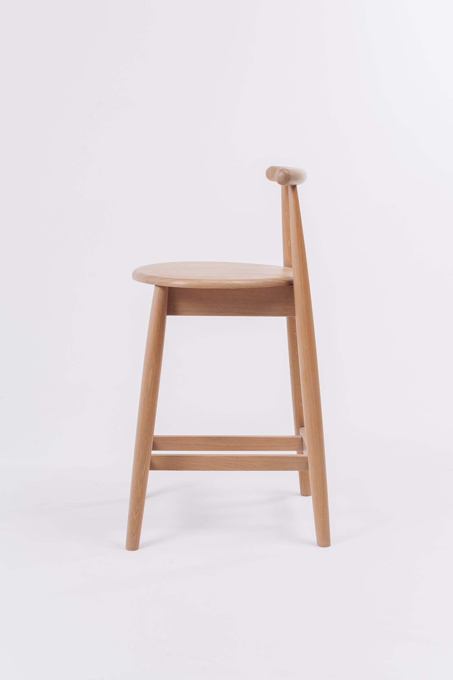 Bar stool made of light oak. Scandinavian style chair and Ukrainian craftsmanship.