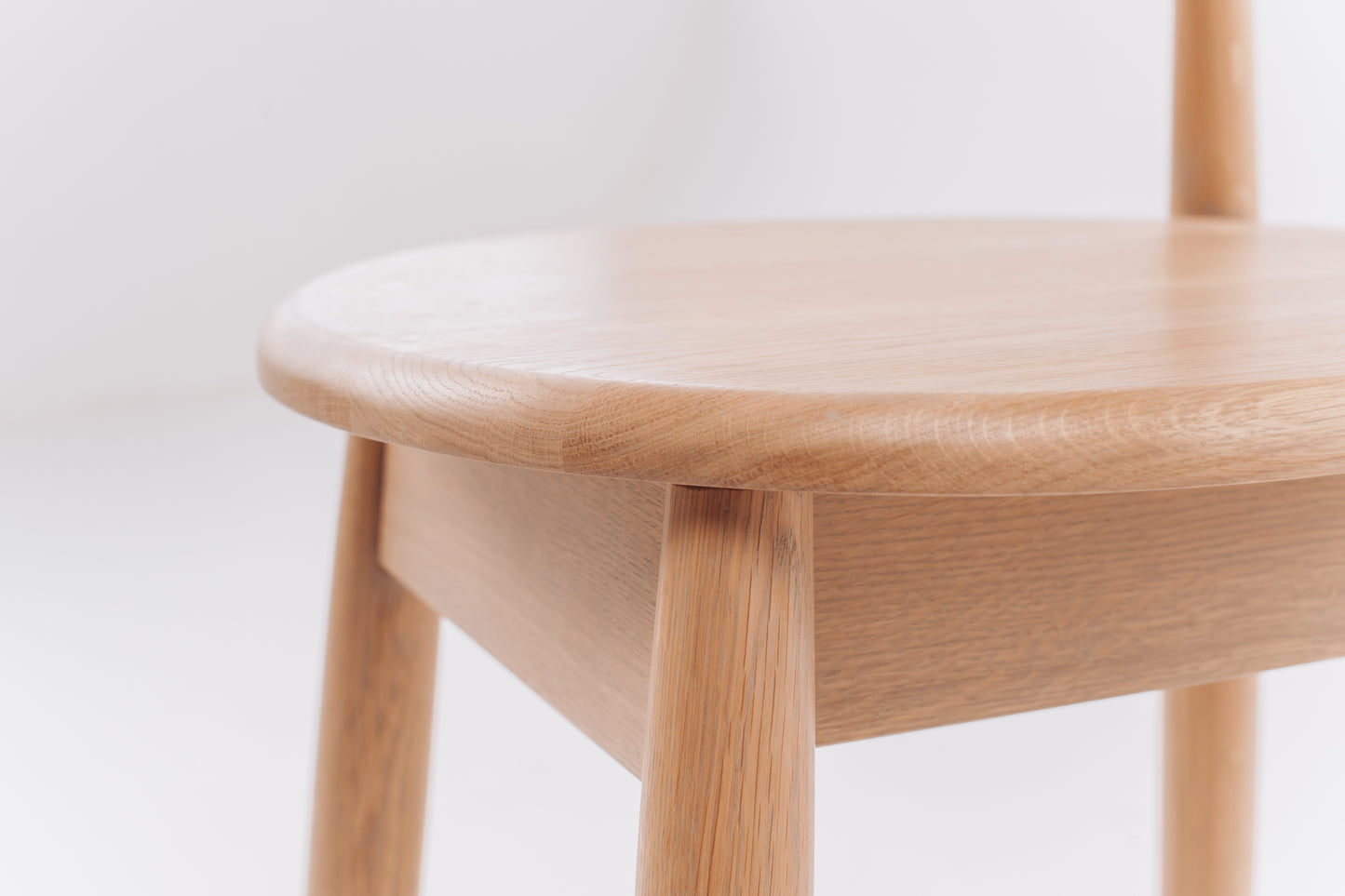 Bar stool made of light oak. Scandinavian style chair and Ukrainian craftsmanship.
