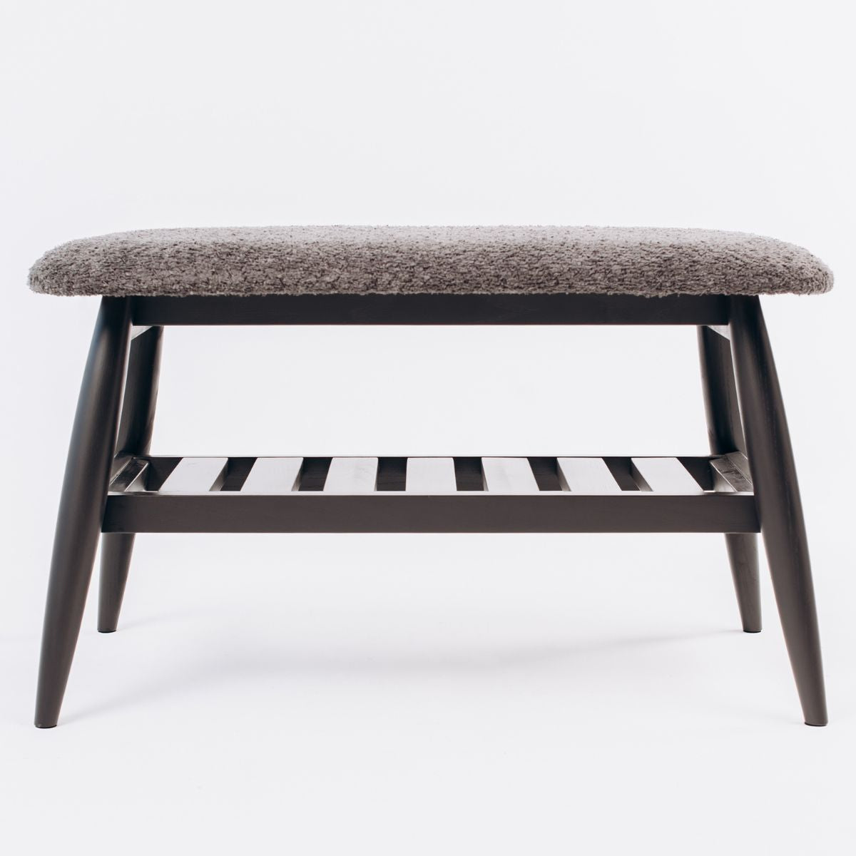 handcrafted black wooden bench with upholstered cushion